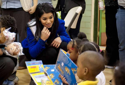 Miss USA Rima Fakih visits Harlem schoolchildren. Miss USA Rima Fakih visits Harlem schoolchildren; Holiday Joy Toy Drive