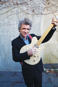 Dan Zanes. Photo by Gala Narezo. Dan Zanes playing guitar
