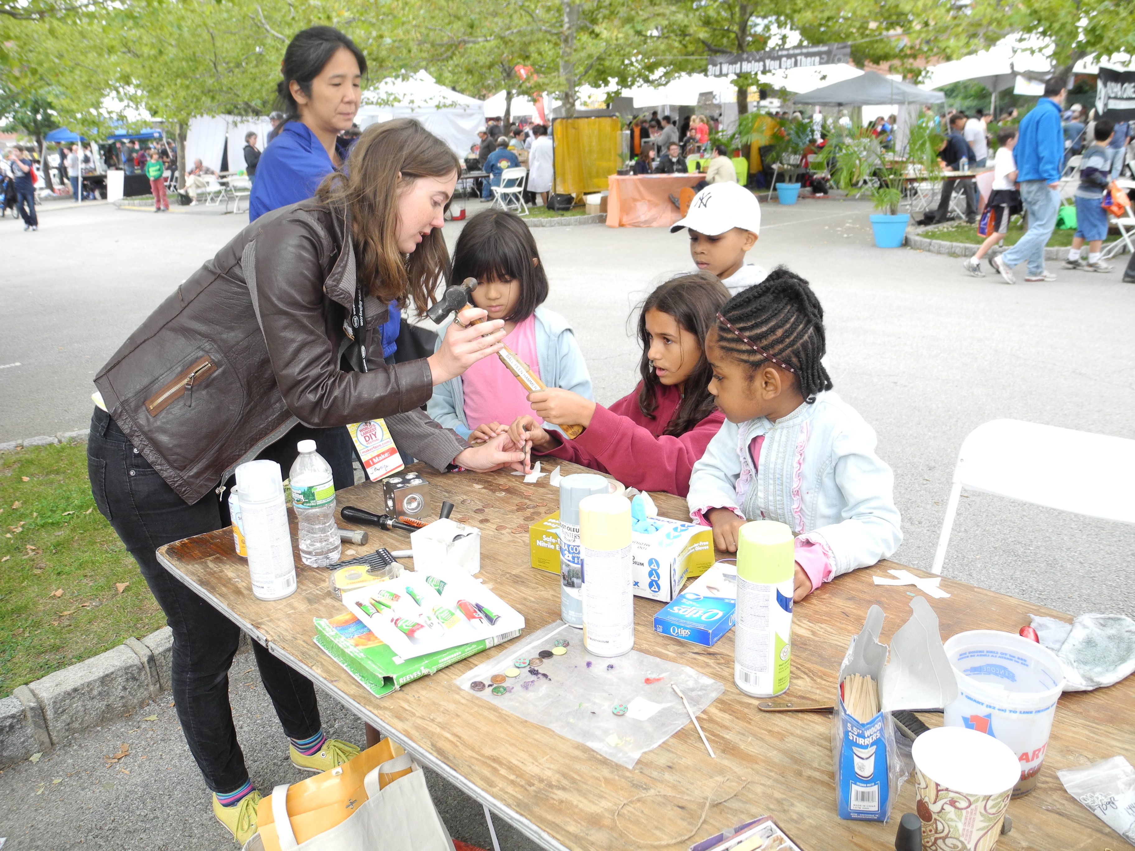 Courtesy Uproar Art Max Goodman, director of Uproar Art, teaches a jewelry workshop at Maker Faire New York.