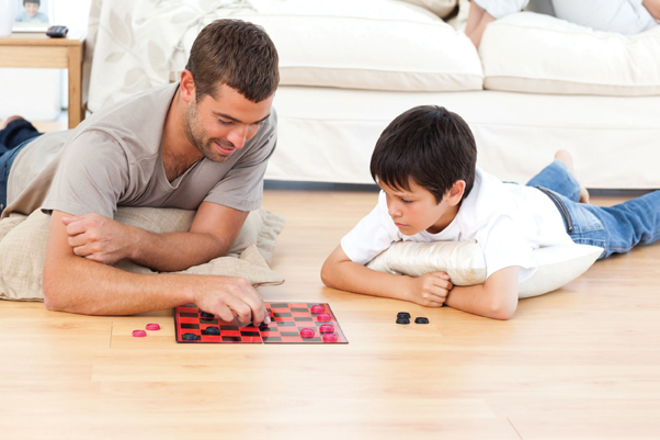 older-man-and-young-boy-playing-checkers.jpg