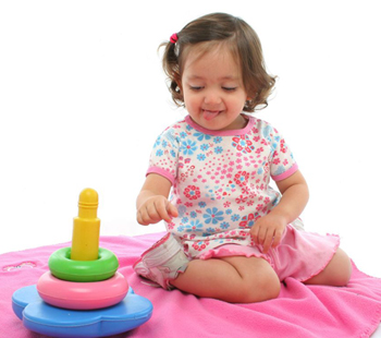 Girl Playing with Toys