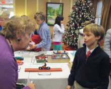 Portledge School Students Visit Atria Glen Cove Senior Center