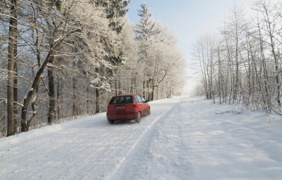Winter Safety Tips for Driving with Little Ones car on snowy road