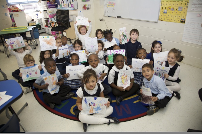 Courtesy Harlem Hebrew Charter School students show art work