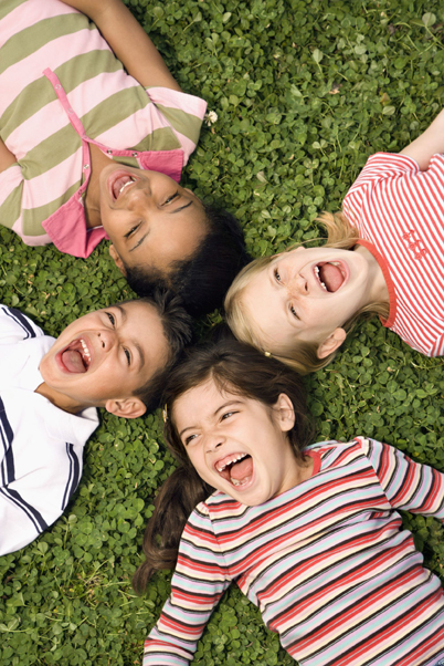 Tips to prevent lice children laying on grass