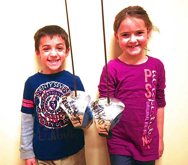 Courtesy Thrust Fencing Academy boy and girl with fencing epees