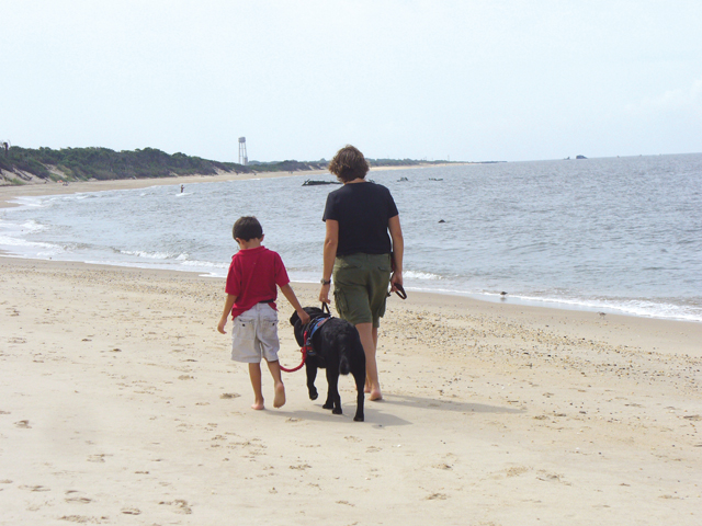 mom and son with guide dog