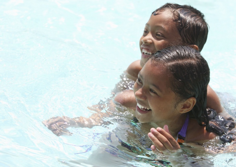 swimming siblings