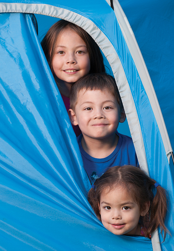 kids camping in a tent
