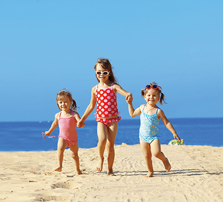 three girls at the beach three girls at the beach