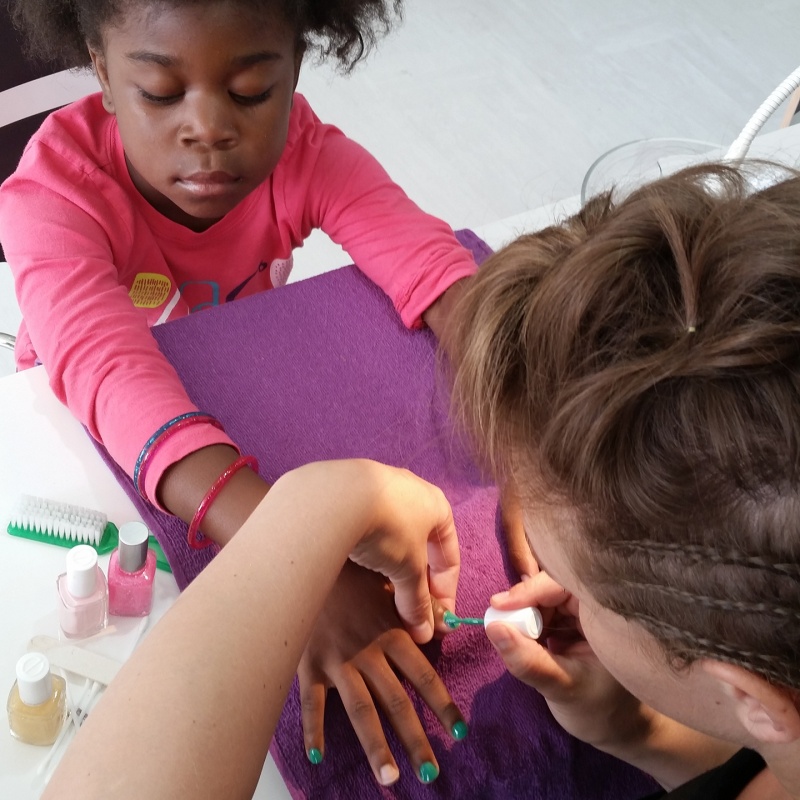 Courtesy A Kid's Dream Hair Salon and Spa young girl getting manicure